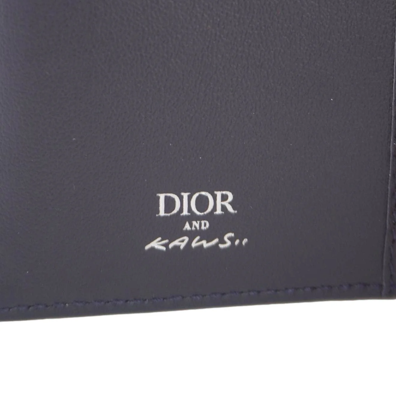 CHRISTIAN DIOR AND KAWS Calfskin Leather Vertical Bifold Card Holder Navy Blue - Image 12