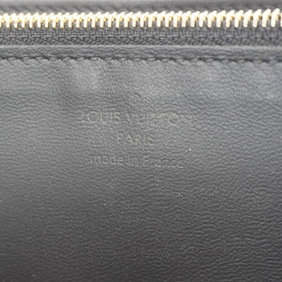 LOUIS VUITTON Capucines Crown Flowers Taurillon Leather Wallet Black - Image 14