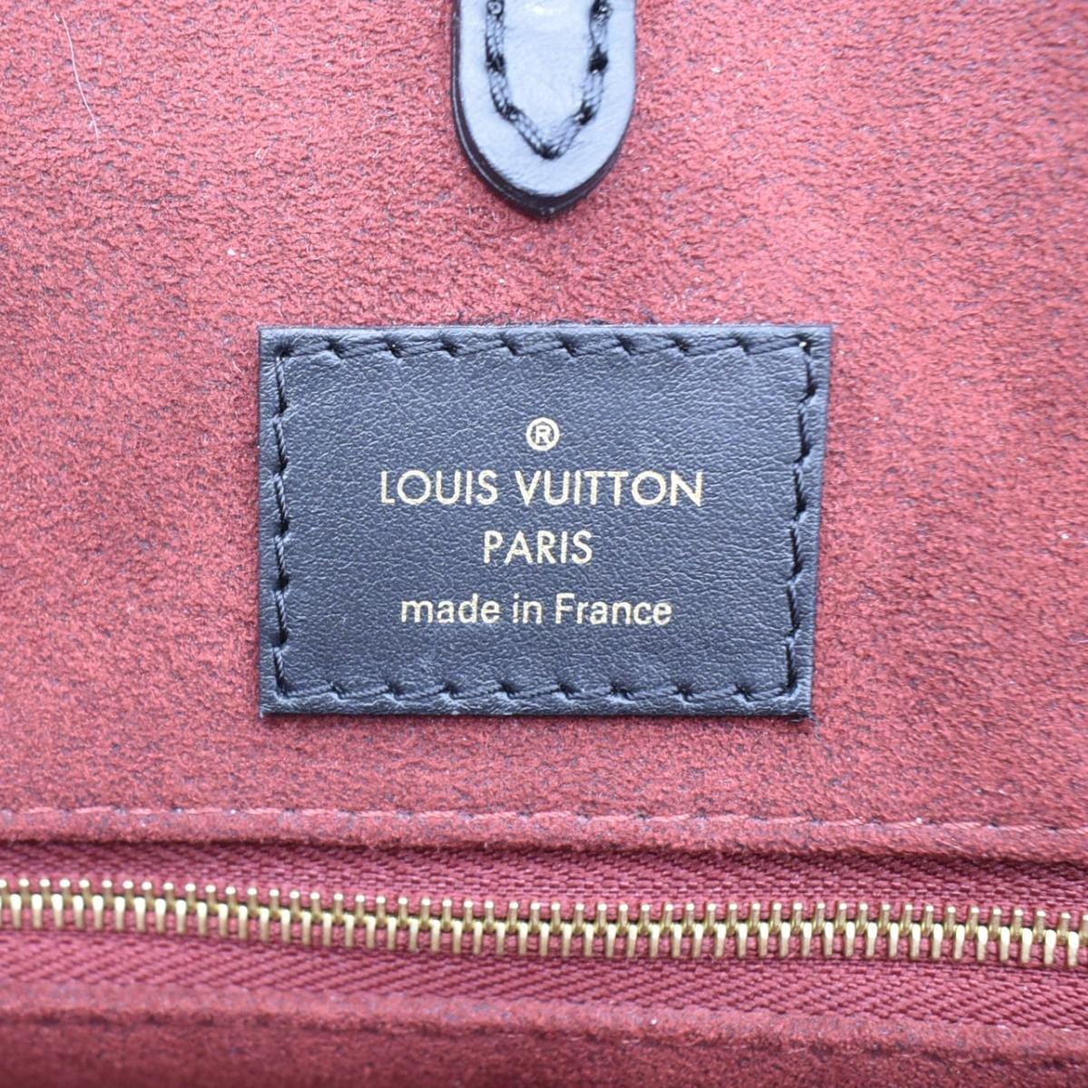 LOUIS VUITTON Onthego MM Giant Monogram Empreinte Leather Tote Bag Bicolor - Image 11