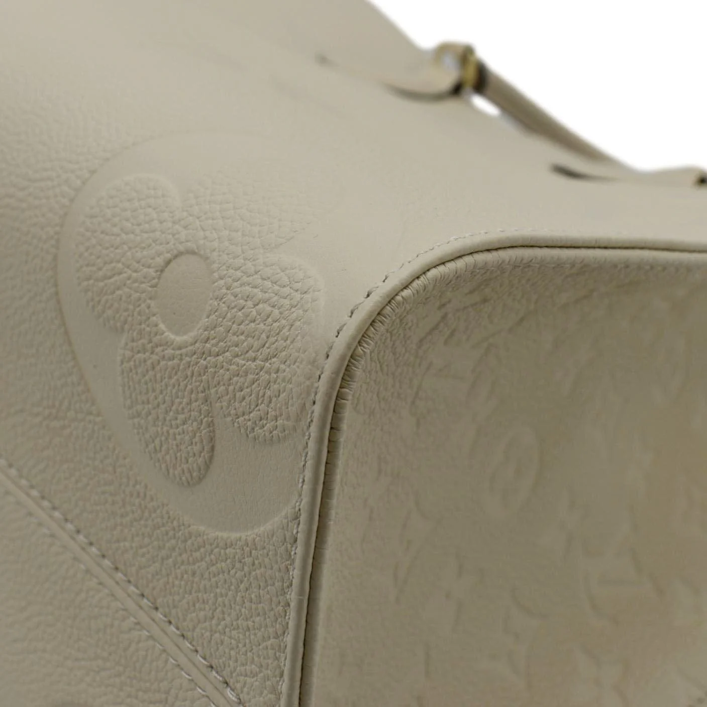 LOUIS VUITTON Onthego MM Monogram Empreinte Leather Tote Bag Cream - Image 9